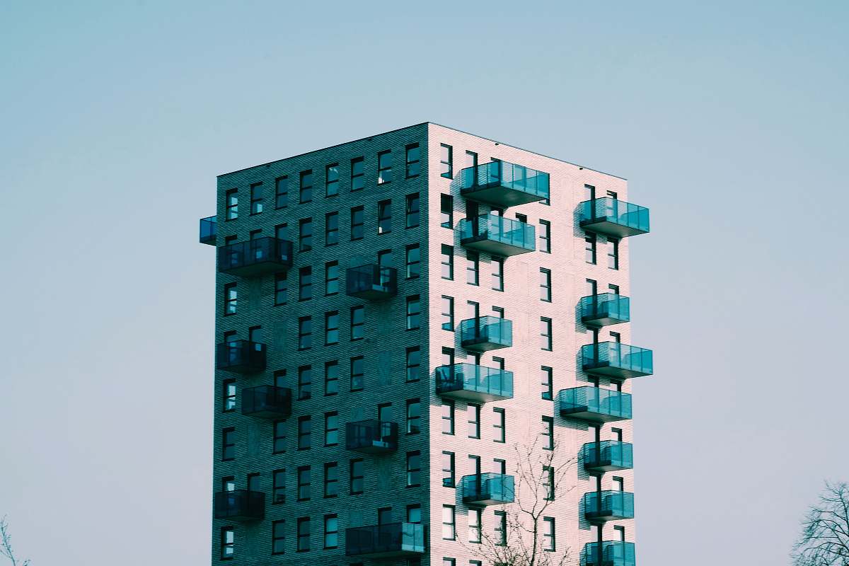 high rise brown concrete building town